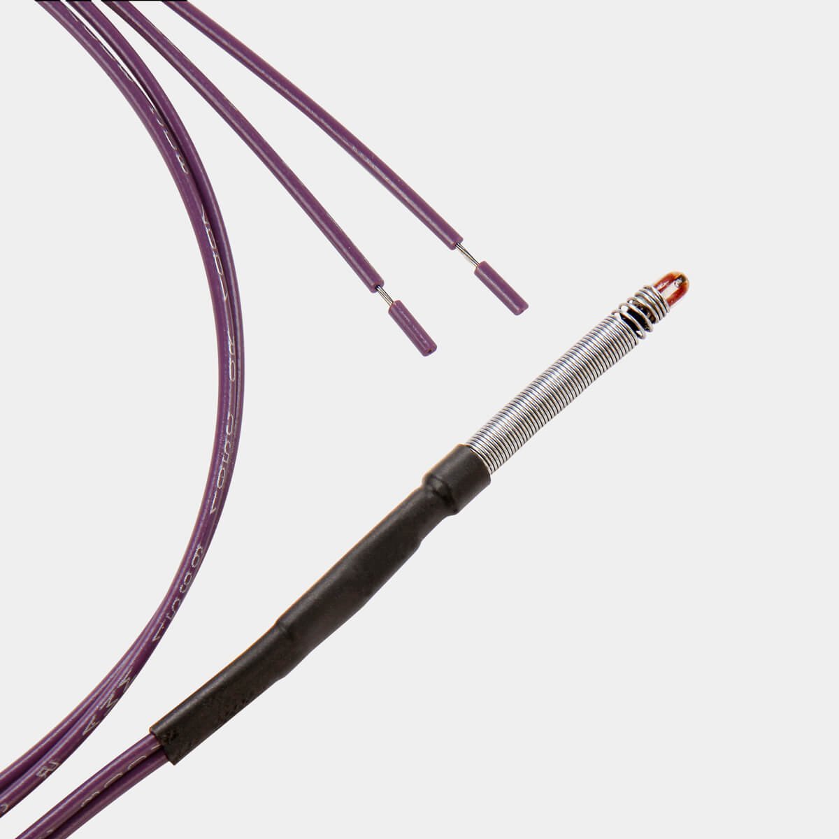 assembled 500C glass bead thermistor with strain relief spring for the original pico 3D printer hot end. Purple wires.